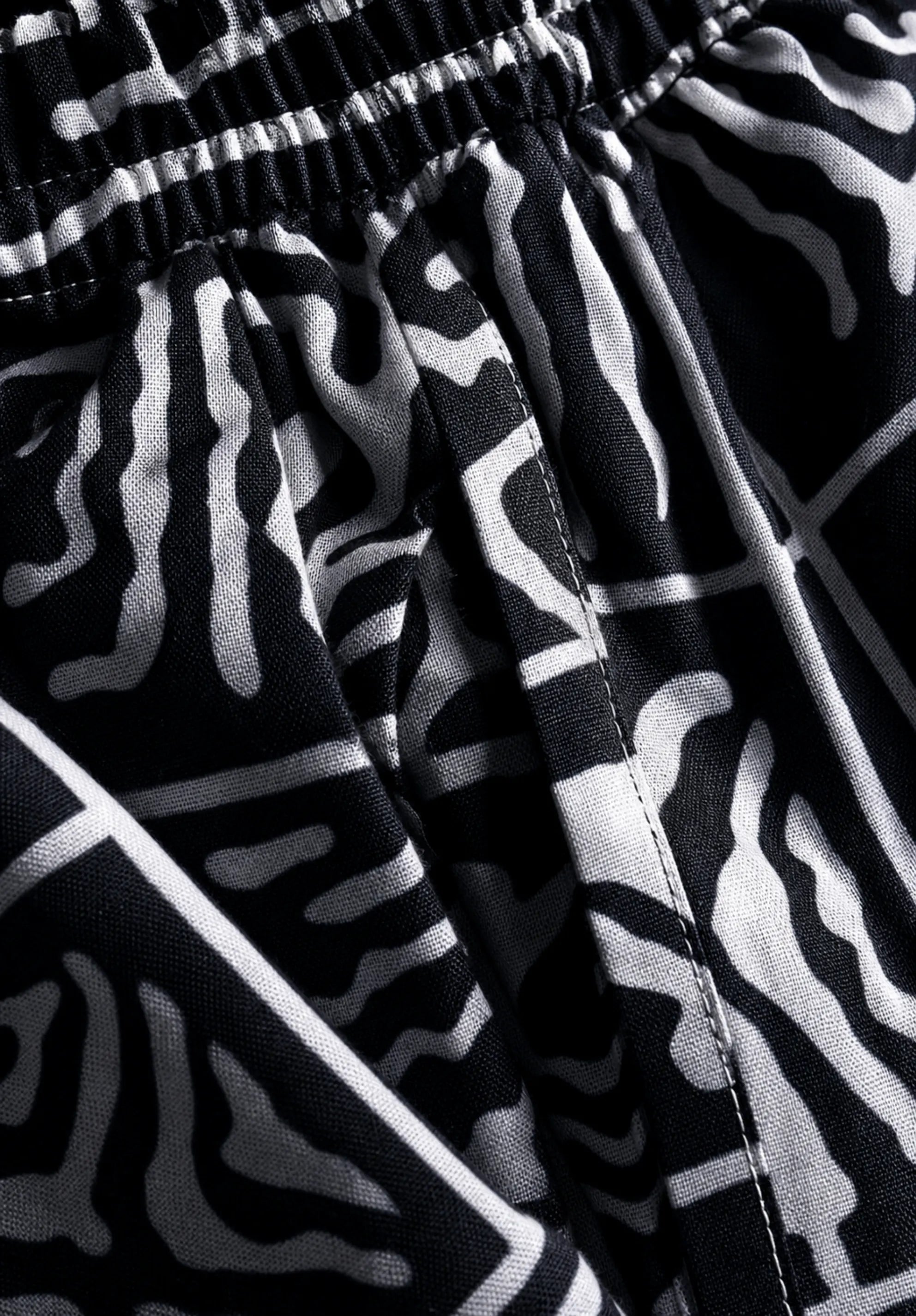 Unisex Kitenge Trousers – blackish Geometric Print